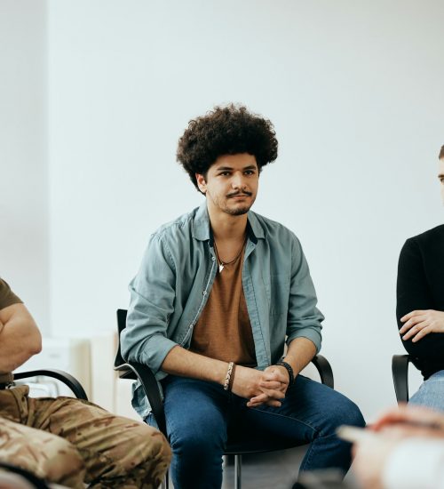 young-muslim-man-attending-group-therapy-at-mental-health-center-